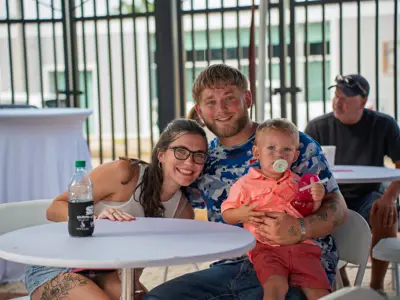 Family Sitting at Table